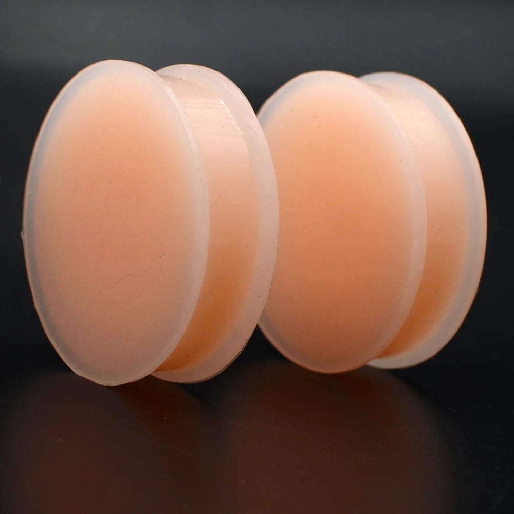 Plugs en silicone couleur chair, paire