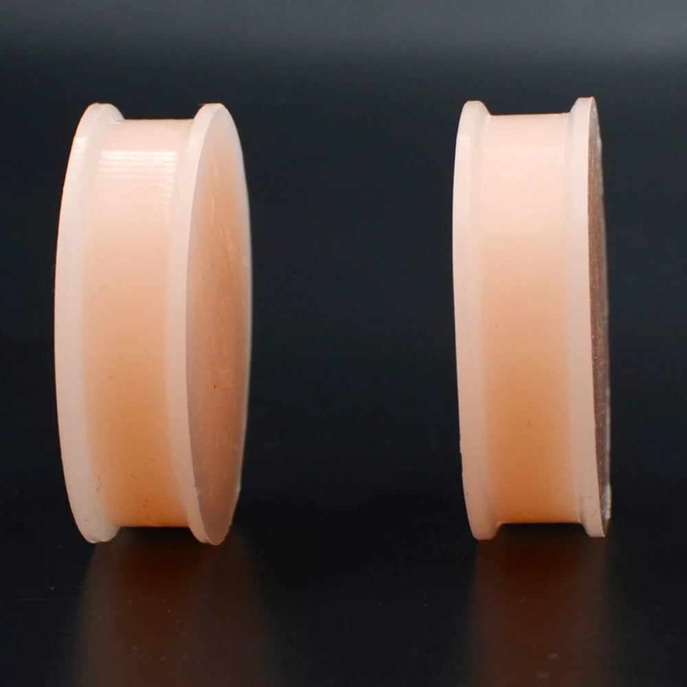 Plugs en silicone couleur chair, profil double flare