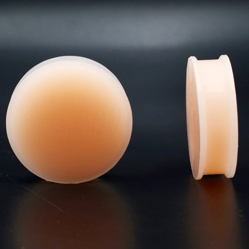 Plugs en silicone couleur chair, gros plan