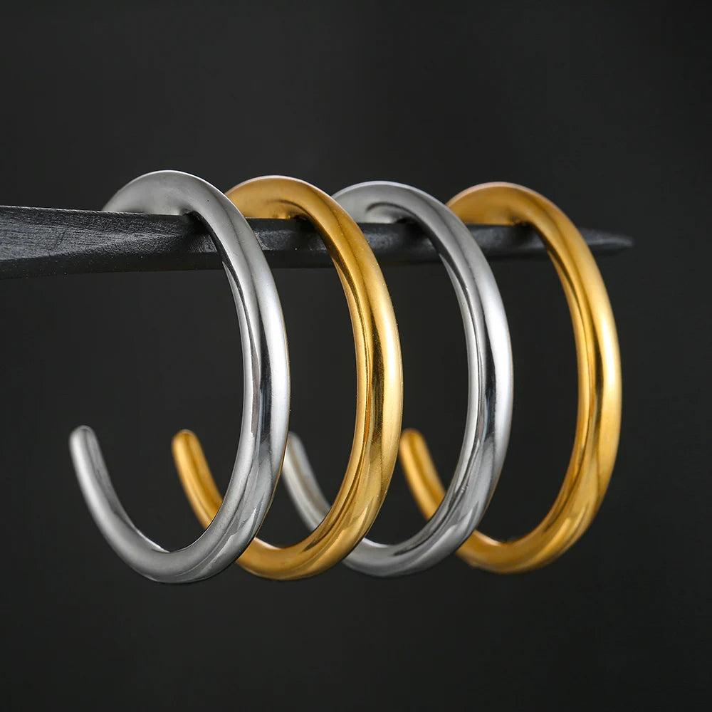 Poids d'oreille croissant de lune en acier inoxydable (paire)