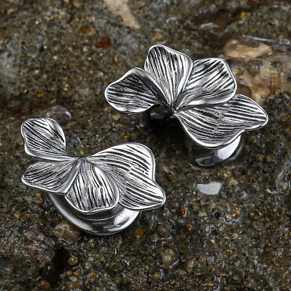 Écarteurs saddle fleur en acier inoxydable (paire)