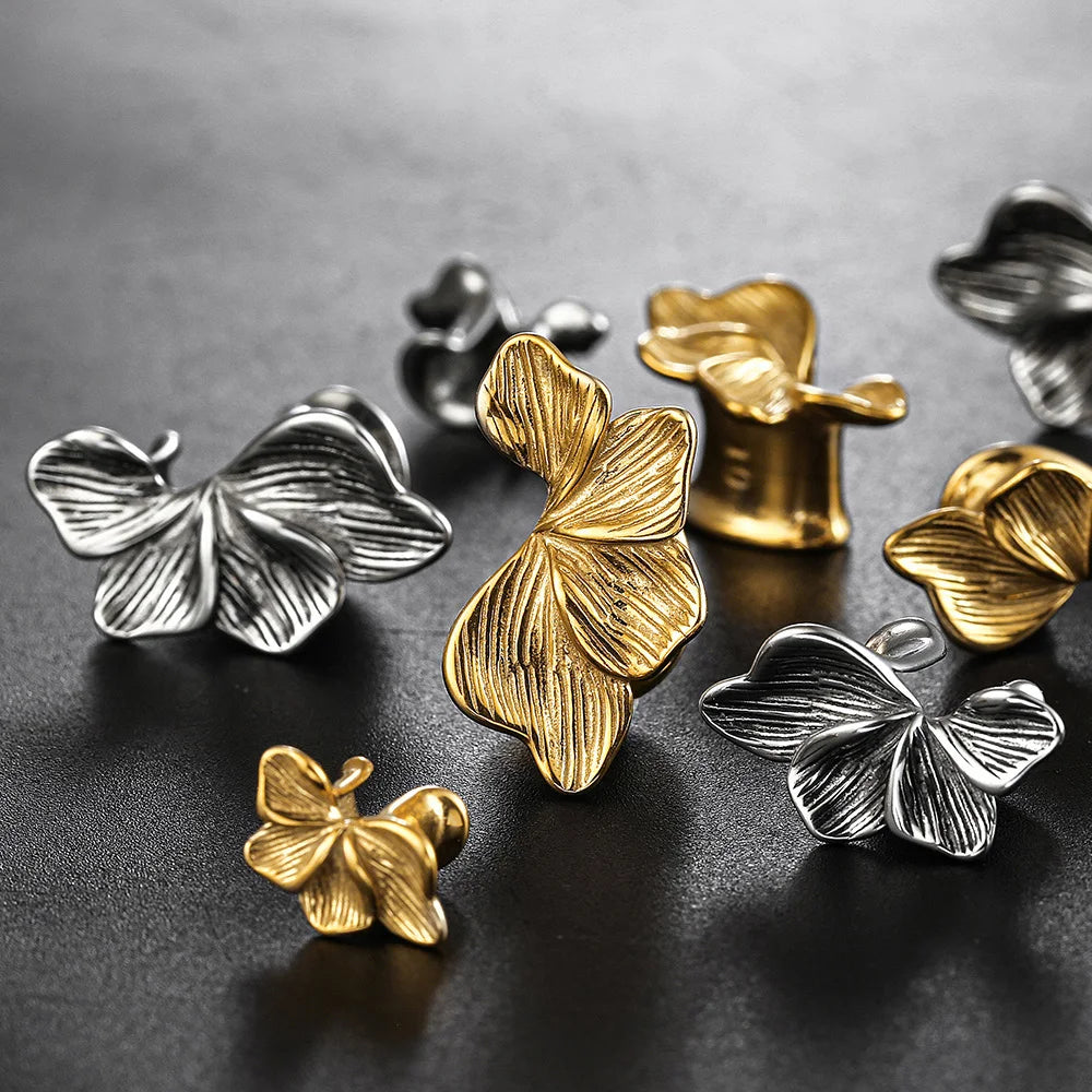 Écarteurs saddle fleur en acier inoxydable (paire)