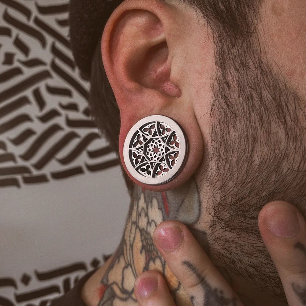 Plugs fleur en acier (paire)