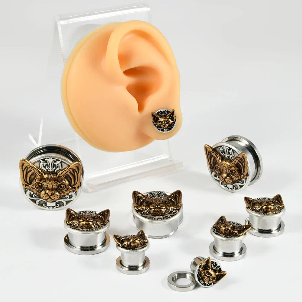 Plugs tête de chat en acier portés, plusieurs tailles
