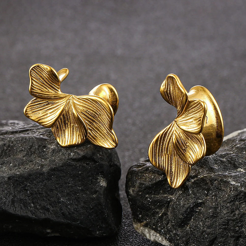 Écarteurs saddle fleur en acier inoxydable (paire)