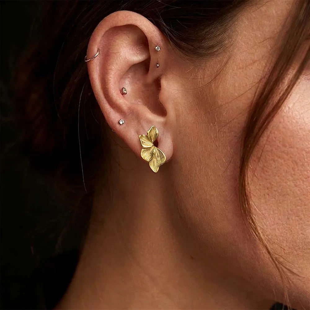 Écarteurs saddle fleur en acier inoxydable (paire)