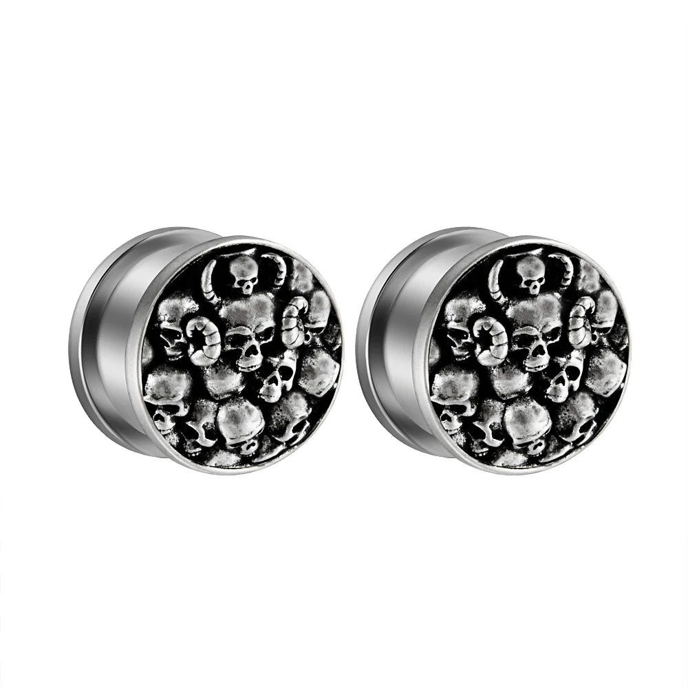 Plugs crânes argentés en acier, paire
