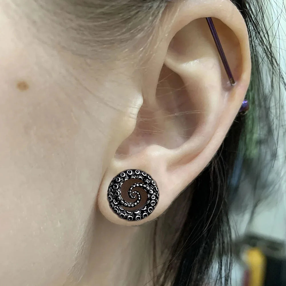 Plugs poulpe en acier (paire)