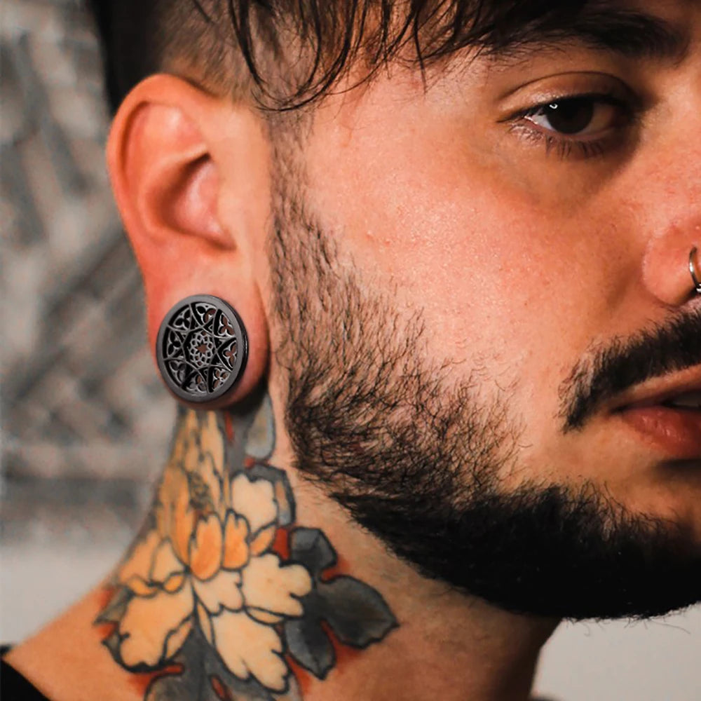 Plugs fleur en acier (paire)
