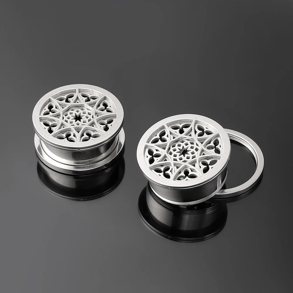 Plugs fleur en acier (paire)